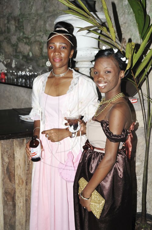 Photo by Christopher Thomas

Alfray Daley (left) and Ladonna Findlater, members of the Georgian Society of Falmouth, are all smiles during the second annual Georgian Society Costume Ball.



 which was held at the Bellefield Great House in Montego Bay on Saturday night.