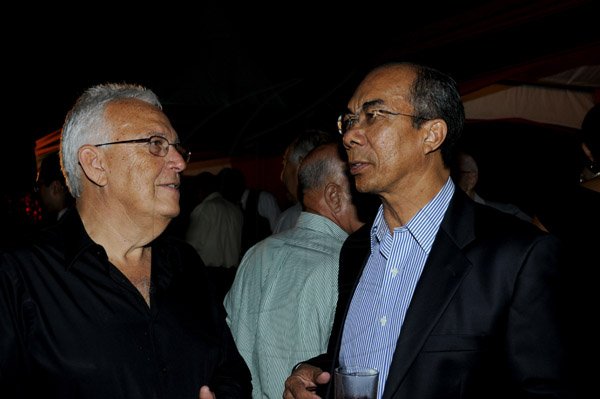Winston Sill / Freelance Photographer
JPS Chairman Hitatsugu Harai host a New Year Reception, held at Plymouth Close, St Andrew on Friday night February 8, 2013. Here are Charles Johnston (left); and Dr. Horace Chang (right).