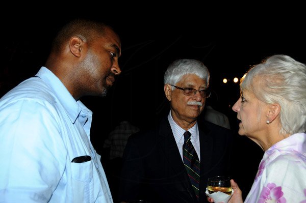 Winston Sill / Freelance Photographer
JPS Chairman Hitatsugu Harai host a New Year Reception, held at Plymouth Close, St Andrew on Friday night February 8, 2013. Here are Minister Julian Robinson (left); Ahmad Zia Mian (centre); and Kelly Tomblin (right).