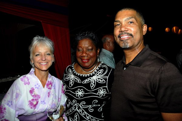 Winston Sill / Freelance Photographer
JPS Chairman Hitatsugu Harai host a New Year Reception, held at Plymouth Close, St Andrew on Friday night February 8, 2013. Here are Kelly Tomblin (left); Carrole Guntley (centre); and Michael McMorris (right).