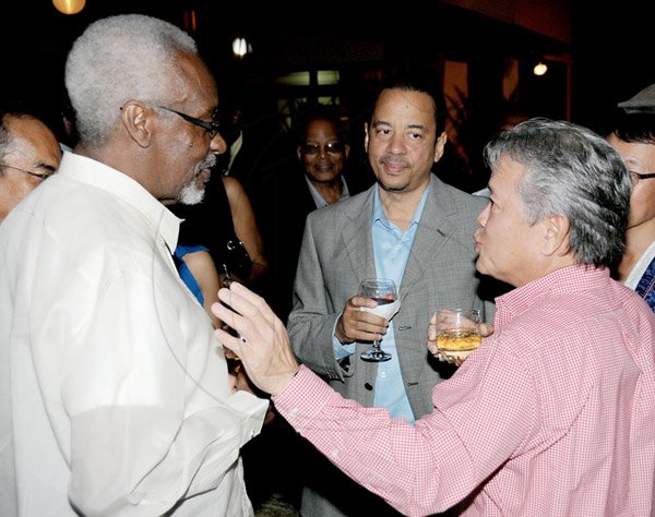 Winston Sill / Freelance Photographer
JPS Chairman Hitatsugu Harai host a New Year Reception, held at Plymouth Close, St Andrew on Friday night February 8, 2013. Here are PJ Patterson (left); Gary??  Barrow (centre); and Gary "Butch" Hendrickson (right).