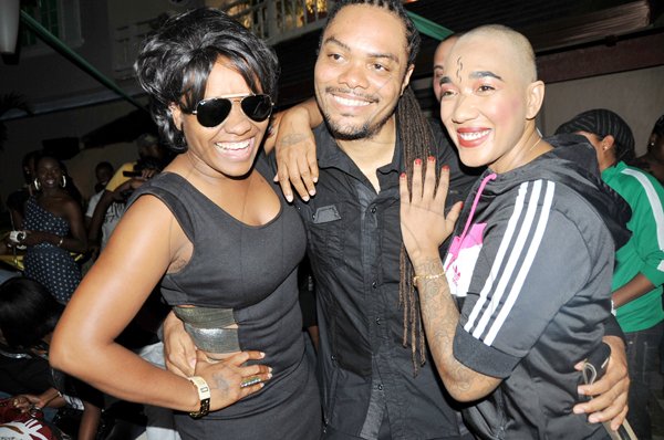 Sheena Gayle/Gleaner Writer
 From left: Tanya Stephen, Taddy P and Diana King all enjoy a good laugh as they celebrated the launch of Taddy P?s Gimme Di Bass album at Blue Beat by the Seas in Montego Bay on Thursday November 3.