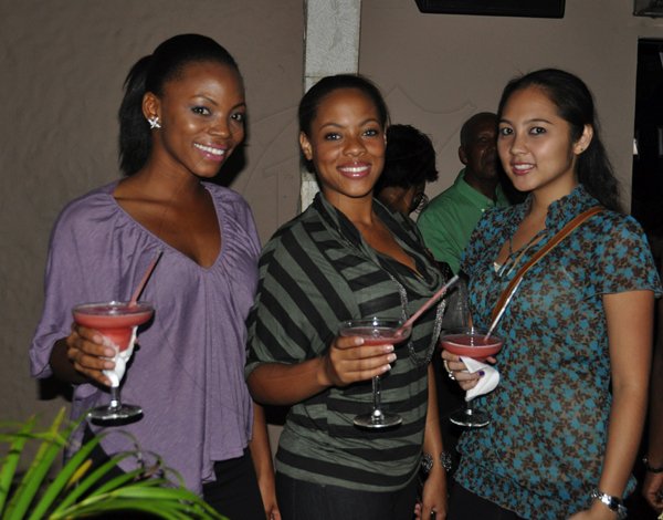 Janet Silvera Photo
?
From L- Kimico Wilson, Karla Kellier and Kim Chin raise their glasses in a toast to?bass guitarist Taddy Ps 'Gimme di Bass' album launch at Blue Beat, Montego Bay?last Thursday night