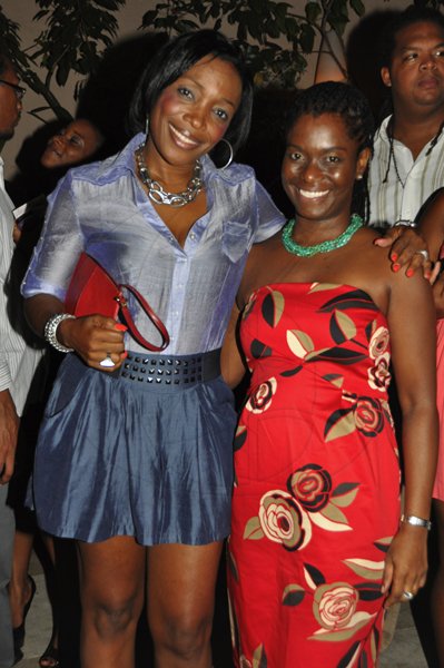 Janet Silvera Photo
?
Carol Dilbert (left) and Maxine Miller?share lens time?at the launch of bass guitarist Taddy Ps 'Gimme di Bass' album?at Blue Beat, Montego Bay,?last Thursday night
