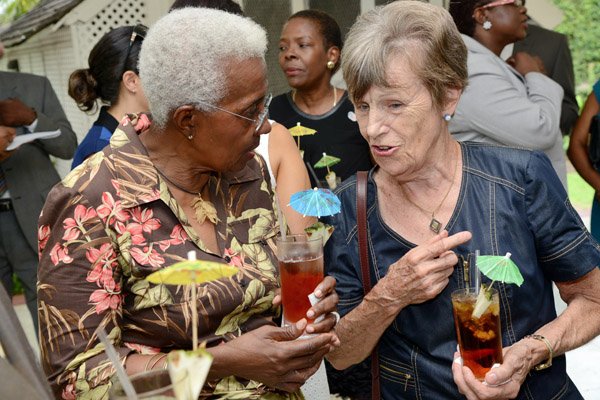 Rudolph Brown/Photographer
Michelle Orane, (left) chat with Jill Roberts at the Sir Patrick Allen, Governor General of Jamaica hosted luncheon For Gleaner Directors in honour of the Gleaner 180 Anniversary at Kings House on Sunday, August 31, 2014