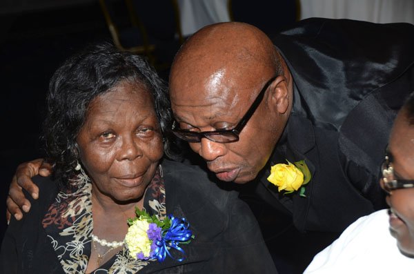 Rudolph Brown/Photographer
Rev John Hewitt raps with fellow pensioner Delvera Brown.

The Gleaner's pensioners luncheon at the Jamaica Pegasus Hotel in New Kingston on Tuesday,March 27-2012
