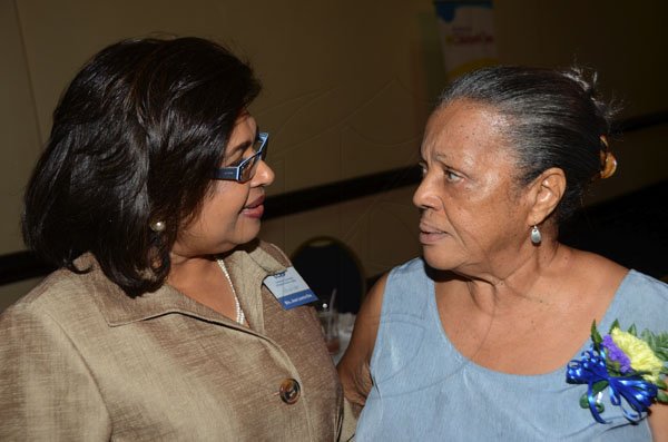 Rudolph Brown/Photographer
Jean Lowrie-Chin (left) raps with Shirley Rodney.

The Gleaner's pensioners luncheon at the Jamaica Pegasus Hotel in New Kingston on Tuesday,March 27-2012