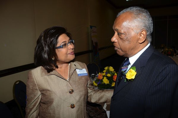 Rudolph Brown/Photographer
Jean Lowrie-Chin, guest speaker at the Gleaner pensioners luncheon greets veteran sports journalist Tony Becca.

at the Jamaica Pegasus Hotelin New Kingston on Tuesday,March 27-2012