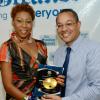 Rudolph Brown/Photographer
Christopher Barnes Managing Director of the Gleaner Company presents the Top sales Representative of the Year to Sandra Brown Bennett at the Gleaner sales awards ceremony at the Terra Nova Hotel in Kingston on Monday, January 20, 2014