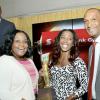 Rudolph Brown/Photographer
Natalie Neita-Headley, Minister of State in the Ministry of Sports and Lissant Mitchell, (right) CEO Scotia Investments make presentation to Olympian Shelly-Ann Fraser Pryce female athlete of the year while Usain Bolt, (left) Male athlete of the year looks on at the Scotiabank Golden Cleats Awards Luncheon at Venetian Suite, Terra Nova Hotel on Tuesday, January 8, 2013.