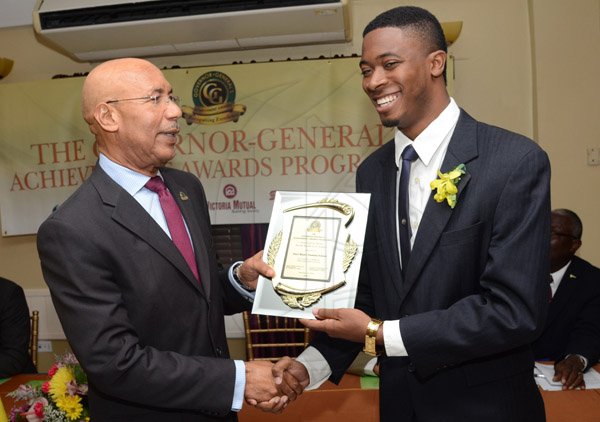 Rudolph Brown/Photographer
GG presents awward to Joel Nomdarkham at the Governor General’s Achievement Award for the County of Surrey presentation Ceremony for recipients on Thursday, September 25, 2014