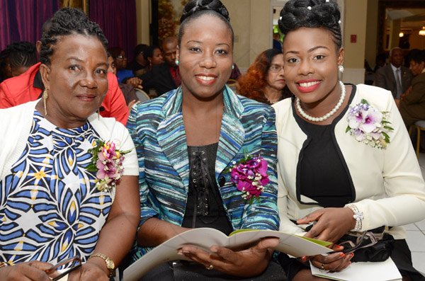 Rudolph Brown/Photographer
From left are Pansy Murphy, Tameka Hue Hamilton and Shanese Watson pose at the Governor General’s Achievement Award for the County of Surrey presentation Ceremony for recipients on Thursday, September 25, 2014