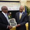 Rudolph Brown/Photographer
Governor General Sir Patrick Allen (centre) presents Adolph Murdock (left) with one of the 14 Jamaica 50th Jubilee Awards for Excellence while Custos of St Mary Bobby Pottinger looks on.

Governor General's Achievement Awards at Kings House on Tuesday, November 13, 2012