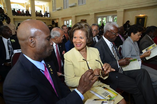 Rudolph Brown/Photographer
Custos of Kingston Steadman Fuller seems to be comparing spectacles with Ambassador Evadne Coye.

Governor General's Achievemnet Awards at Kings House on Tuesday, November 13, 2012