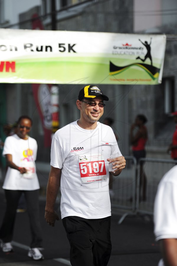 Ricardo Makyn/Staff Photographer
Don Wenby CEO of Grace  Kennedy and Company Limited at the Grace Kennedy Education Run 5K on Sunday 8.7.2012