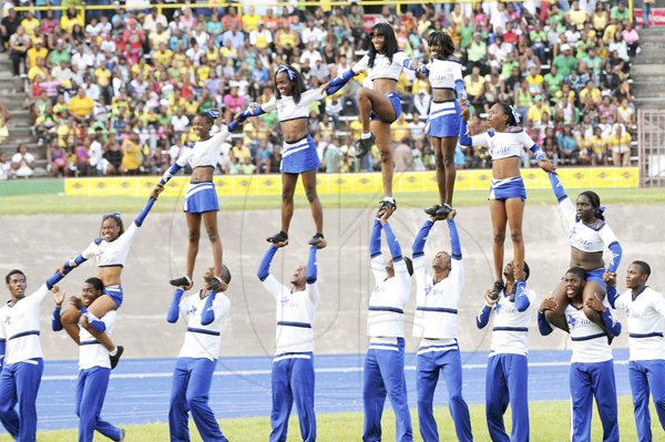 CONTRIBUTED
A combined cheerleaders group performing an exciting balancing act at the Grand Gala at the National Stadium on Saturday.