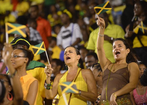 Rudolph Brown/ Photographer
Cindy Breakspear, (centre) mother of Damion 'Junior Gong' watch her son preformed at Jamaica Independence Grand Gala 2013 at the National Stadium on Tuesday, August 7, 2013