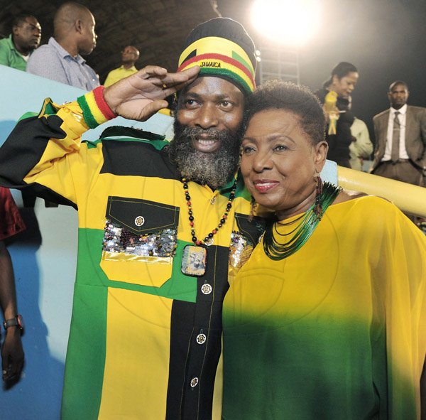 Ian Allen/Photographer
Veteran deejay Capleton shares lens space with Entertainment Minister Olivia 'Babsy' Grange during the Grand Gala 2016 at the National Stadium in Kingston on Saturday night.
