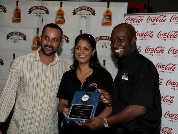 Winston Sill / Freelance Photographer
Appleton Estate All-Jamaica Grill Off 2012 Prizegiving Ceremony, held at Fiction Night Club, Market Place on Thursday night March 7, 2013. Here are Craig Powell (left), Promoter, All-Jamaica Grill Off; Kerry Bell (centre); and Garth Walker (right), of Wealth Grillers.
