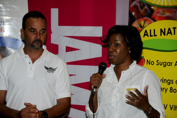 Winston Sill / Freelance Photographer
Media Launch of the All Jamaica Grill Off 2013, held at Fiction Club, Market Place, Constant Spring Road on Saturday April 13, 2013. Here are craig Powell (left), Promoter; and  Karis-Ann Gordon (right), of Reggae Jammin.