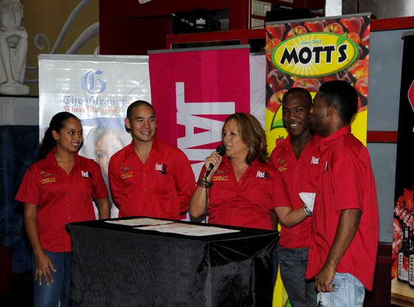 Winston Sill / Freelance Photographer
Media Launch of the All Jamaica Grill Off 2013, held at Fiction Club, Market Place, Constant Spring Road on Saturday April 13, 2013. Here is the Jo Jo' Jerk Pit Team.