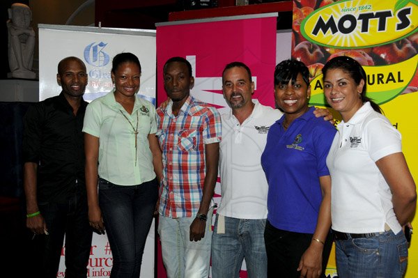 Winston Sill / Freelance Photographer
Media Launch of the All Jamaica Grill Off 2013, held at Fiction Club, Market Place, Constant Spring Road on Saturday April 13, 2013. Here are Shyan Simmonds (left);  Candice Britton (second left); Cons. Christopher Charlie (third left); Craig Powell (third right); Sopt. Stephanie Lindsay (second right); and Kerry Bell (right).