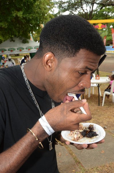 Rudolph Brown/Photographer
Vernon Robinson taste All Jamaican, Grill Off at Hope Gardens on Sunday, June 17-2012