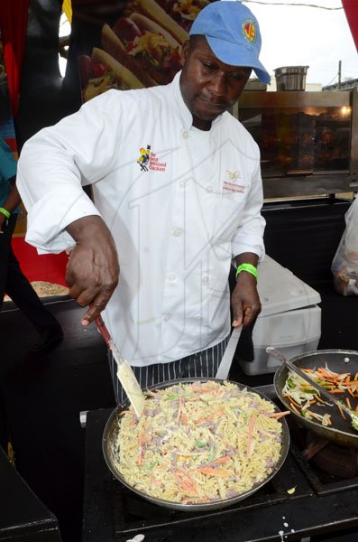Rudolph Brown/Photographer
Chef Garnett Whyle at the All Jamaican, Grill Off at Hope Gardens on Sunday, June 17-2012