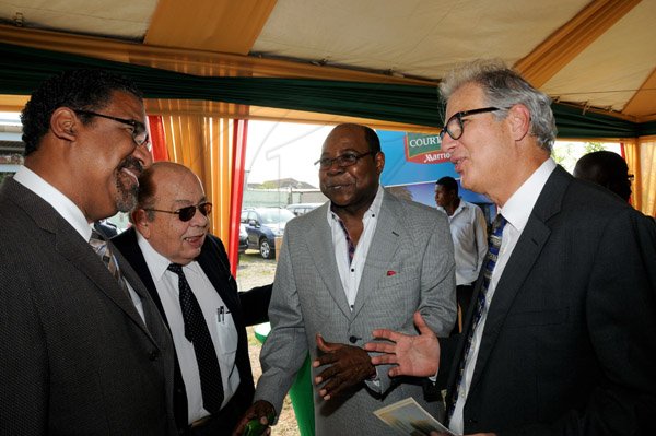 Winston Sill/Freelance Photographer
Pan Jamaican and Caribe Hospitality host Ground Breaking Ceremony for the Courtyard Marriott  Hotel, held at Park Boulevard, New Kingston on Thursday July 25, 2013. Here are Dr. Wykeham McNeill (left), Minister of Tourism and Entertainment; Francis Kennedy (second left), President of Jamaica Chamber of Commerce; Edmund Bartlett (centre), Opposition Spokesman on Tourism; and Stephen Facey (right), Chairman Pan Jamaican.