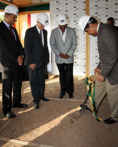 Winston Sill/Freelance Photographer
Pan Jamaican and Caribe Hospitality host Ground Breaking Ceremony for the Courtyard Marriott  Hotel, held at Park Boulevard, New Kingston on Thursday July 25, 2013. Here are Andrew Holness (left), Opposition Leader; Stephen Facey (second left), Chairman Pan Jamaican; Edmund Bartlett (second right), Opposition Spokesman on Tourism; and Dr. Wykeham McNeill (right), Minister of Tourism and Entertainment.