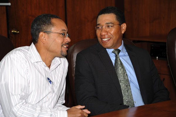Norman Grindley/Chief Photographer 
Gleaner Managing Director Christopher Barnes (left) chats with Opposition Leader Andrew Holness.

Scenes from the Monday's soft  launch of GSAT Tutor at The Gleaner's North Street, central Kingston offices. By early January 2013, The Gleaner, in collaboration with A-Plus Learning Limited will launch the online training tool which is full of animation for students preparing for the Grade Six Achievement Test.