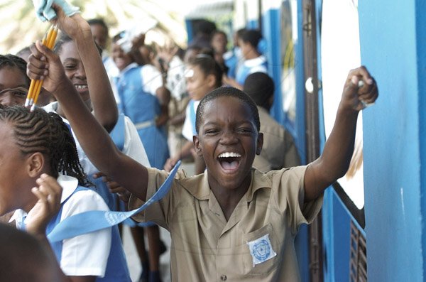 Ricardo Makyn/Staff Photographer.
Students from the Jessie Ripoll Primary School  celebrate after completing their GSAT exams at the School last Friday.