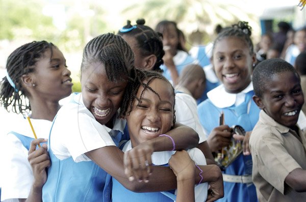 Ricardo Makyn/Staff Photographer.
Jessie Ripoll Primary School students celebrate after completing their GSAT Exams at the School on Friday.