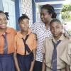 Jermaine Barnaby/Photographer<\n>Jennifer Clemmings (center) of Denham Town Primary talking to students about their upcoming Gsat expectations on Monday June 15, 2015.