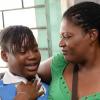 Jermaine Barnaby/Photoghrapher
Akiela SCott (left) was all tears when she found out that her Gsat placement was Mona High. Mona was her second choice, here she's tells her dispointment to a parent, Vievenne Young at the Mountain View Primary on Thursday June 18, 2015.