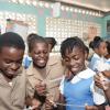 Jermaine Barnaby/Photoghrapher
Students look on their Gsat results on a piece of paper at the Mountain View Primary School in Kingston on Thursday June 18, 2015.