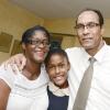 Jermaine Barnaby/Photographer<\n>Hannah Farr (center) with her parents Robert Farr (right) and mother Sonia Farr (left) following the GSAT performance which she scored full 100% in all subjects at the Vaz Preparatory school on Wednesday June 17, 2015. Farr will be attending Campion College.