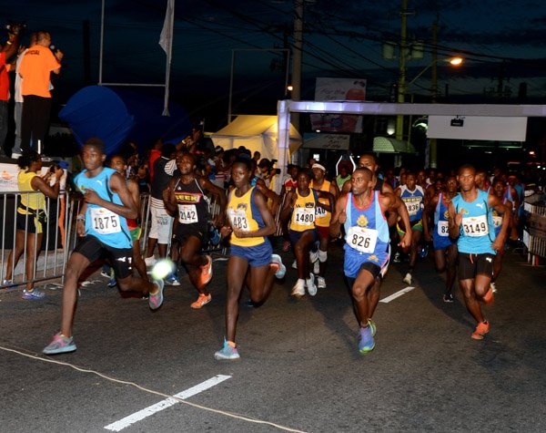 Winston Sill/Freelance Photographer
Guardian Group,  Keep It Alive 5K Night Run, held in New Kingston on Saturday night June 21, 2014. Here the runners are off and running.