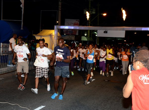 Winston Sill/Freelance Photographer
Guardian Group,  Keep It Alive 5K Night Run, held in New Kingston on Saturday night June 21, 2014. Here the walkers ore off.