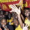 Norman Grindley /Chief Photographer
These students celebrate Holmwood's recent victory at the ISSA/GraceKennedy Boys' and Girls' Championships inside the school's auditorium yesterday.