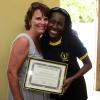 Gladstone Taylor / Photographer

Prof. Rebecca Lasher (Western Carolina University) accepts a certificate of appreciation from Francena Pryce (President for (United Mountain View Parents In Action) at the Hampstead Park Community center yesterday afternooon