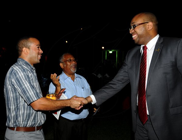 Winston Sill / Freelance Photographer
Launch of Dr. Henry Lowe Autobiography titled "It Can Be Done", held at Eden Gardens, Lady Musgrave Road on Wednesday night November 28, 2012. Here are Christopher Blythe (left); Neville Blythe (centre); and Delano Seiveright (right).