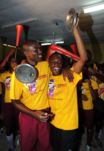 Norman Grindley/Chief Photographer
Holmwood Technical  High school  students  continue to celebrate their victory at their Manchester school Auditorium April 4, 2011. The school won the girls championship at the  ISSA/Gracekennedy Boys and Girls Championship last Saturday at the National Stadium.