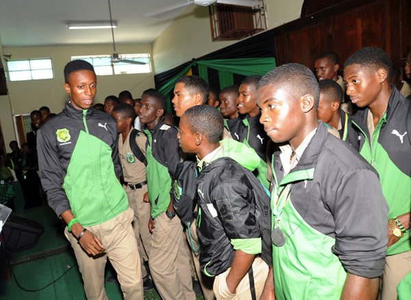 Norman Grindley/Chief Photographer
Calabar high school family celebrates at the school after their victory on Saturday at champs, March 18, 2013.