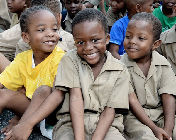 Ian Allen/Photographer
Smiling Students at Holy Family Primary School during devotion for Teachers Day at the school on Wednesday.