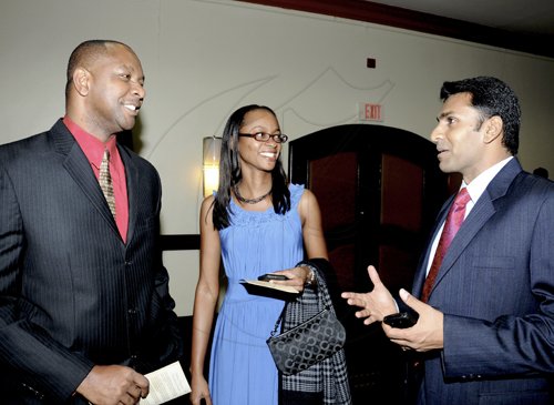 Winston Sill / Freelance Photographer
Pete Smith (left) and Davia Brown listen keenly to Alok Jain.

Institute of Chartered Accountants of Jamaica (ICAJ) Annual Awards Dinner, held at the Jamaica Pegasus Hotel, New Kingston on Thjursday night December 1, 2011