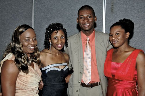 Winston Sill / Freelance Photographer
Hardworking staff at the ICAJ (from left) Ann-Marie Ward, executive assistant; Vinessa Maxwell, PR assistant; Andrae Satchell, IT officer; and Sophia Dorman, accountant share a pic.

 Annual Awards Dinner, held at the Jamaica Pegasus Hotel, New Kingston on Thjursday night December 1, 2011