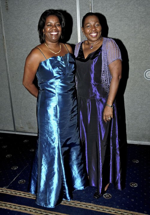 Winston Sill / Freelance Photographer
Cheryl Gardner (left) and Maxine Chin flash bright smiles at the Institute of Chartered Accountants of Jamaica (ICAJ) Annual Awards Dinner, held at the Jamaica Pegasus Hotel, New Kingston on Thjursday night December 1, 2011