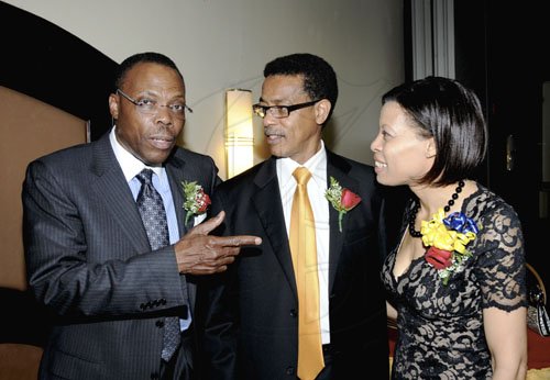 Winston Sill / Freelance Photographer
Guest speaker at the Institute of Chartered Accountants of Jamaica (ICAJ) Annual Awards Dinner George Willie (left) raps with past president Archibald Campbell and Allison Peart.

, held at the Jamaica Pegasus Hotel, New Kingston on Thjursday night December 1, 2011