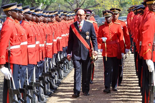 Jermaine Barnaby/Photographer
Governor General Sir patrick Allen makes an inspection of the guard of honour at the Annual Independence Day Ceremony at  King's House on Wednesday, August 6, 2014.